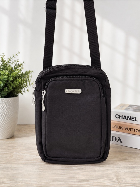 Baggallini Handbags - Baggallini Dual Zipper N/S
Crossbody Bag in black guc very popular bag!